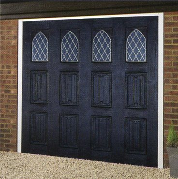 Picture of bespoke Wessex Gothic GRP garage door with leaded window option